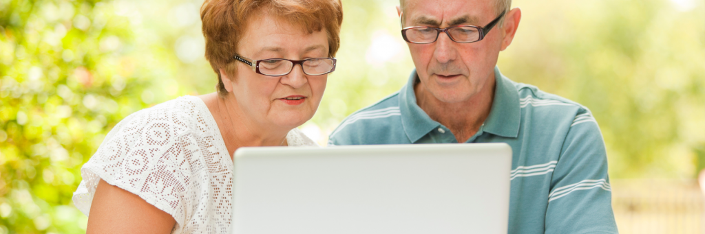 Older couple looking at the computer